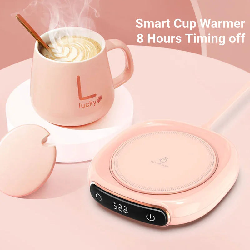 Pink smart cup warmer with 8-hour timer, heating a steaming coffee mug on desk