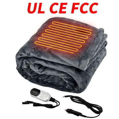 Folded grey electric heated blanket with a remote control and car power adapter