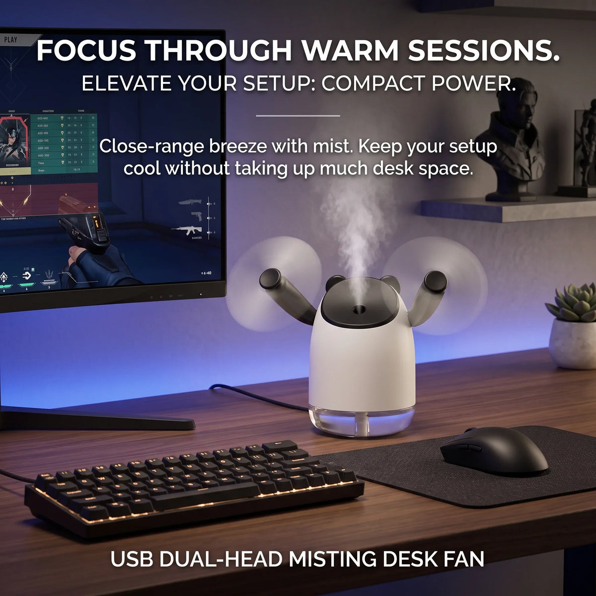 InnoDeviceHub AeroMist dual-head misting desk fan on a gaming setup with keyboard and monitor.