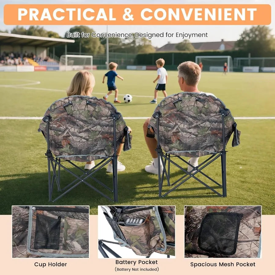 Friends enjoying a bonfire with oversized heated camping chairs, staying warm and cozy during chilly nights.