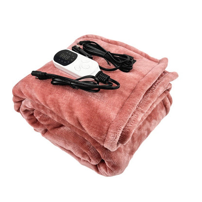 Folded pink electric heated blanket with a digital temperature control remote.